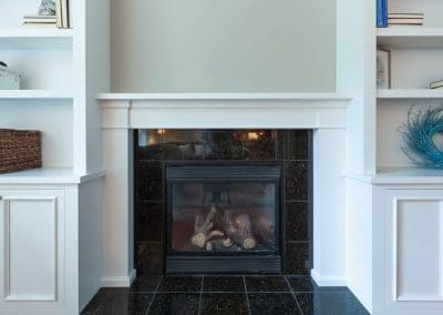 fireplace cabinetry glen ellyn illinois white book shelves book cases fireplace surround