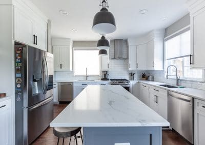 kitchen reface refinish oak cabinets quartz countertop black accent blue island white perimeter walk in pantry
