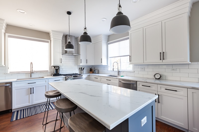 kitchen reface refinish oak cabinets quartz countertop black accent blue island white perimeter walk in pantry