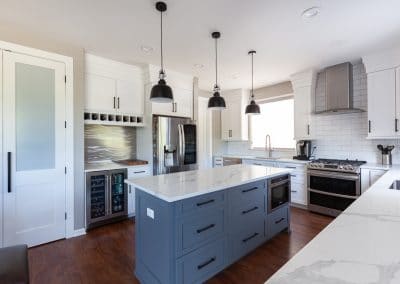 kitchen reface refinish oak cabinets quartz countertop black accent blue island white perimeter walk in pantry