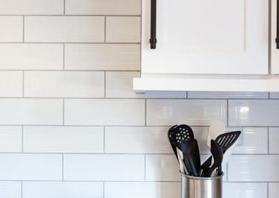 kitchen reface refinish oak cabinets quartz countertop black accent blue island white perimeter walk in pantry