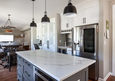 kitchen reface refinish oak cabinets quartz countertop black accent blue island white perimeter walk in pantry