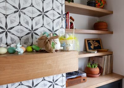 octagon tile fireplace cabinet floating shelves bleached walnut eclectic