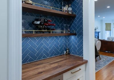 dry bar refinish and reface with walnut butcher block, floating shelves, blue herringbone tile