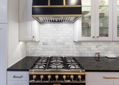 kitchen refinish and reface chicago, illinois bm swiss coffee, transitional style, shaker doors, black range and hood with gold accents