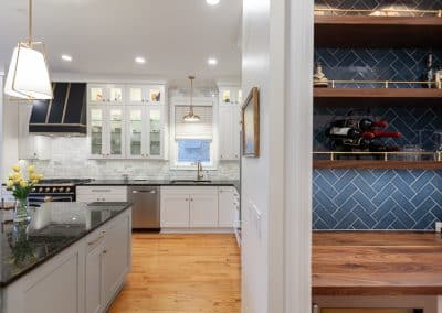 kitchen refinish and reface chicago, illinois bm swiss coffee, transitional style, shaker doors, black range and hood with gold accents