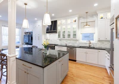 kitchen refinish and reface chicago, illinois bm swiss coffee, transitional style, shaker doors, black range and hood with gold accents