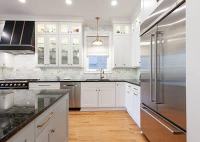 kitchen refinish and reface chicago, illinois bm swiss coffee, transitional style, shaker doors, black range and hood with gold accents